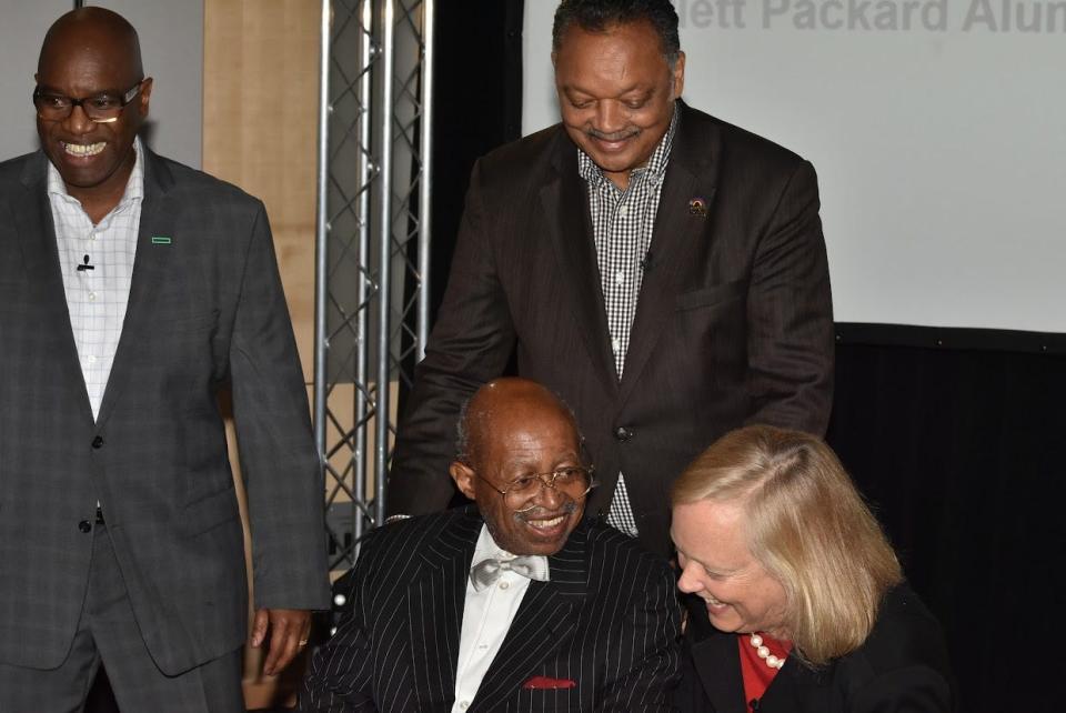 Roy Clay Sr. receiving the Ben Legacy Award in 2017 for leadership in the design of HP's first computer. The award was presented by Meg Whitman, then-president and CEO of HP Enterprises and chairwoman of HP Inc. From left to right: Jambey Clinkscales, Roy Clay Sr., Rev. Jesse Jackson and Meg Whitman.