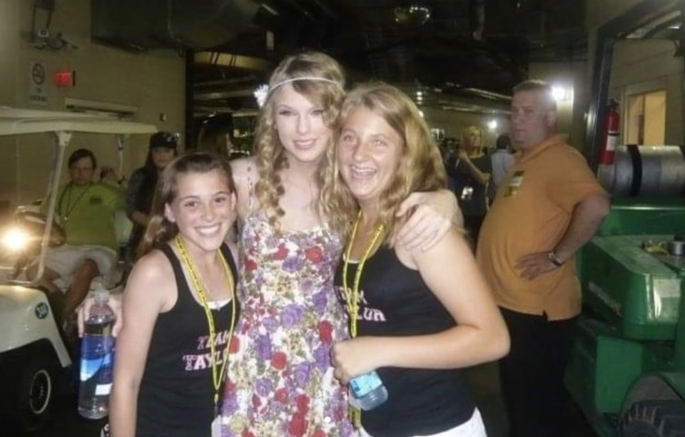 Tay Lautner as a kid in a team taylor shirt with her friend and Taylor Swift