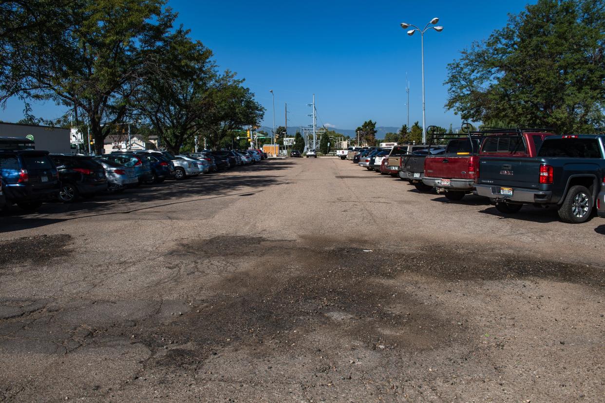 A rough patch awaits drivers at the MAX line parking northeast of the intersection of Drake Road and McClelland Drive on Sept. 6, 2023, in Fort Collins, Colo. The lot is often cited as one of the city's worst.