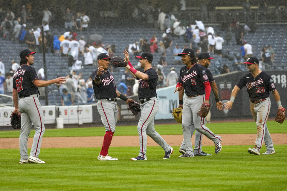 The Washington Nationals celebrate after defeating the New York Yankees in a baseball game, Thursday, Aug. 24, 2023, in New York. (AP Photo/Mary Altaffer)