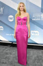 Turner turned up the heat in a hot pink belted look by Louis Vuitton.