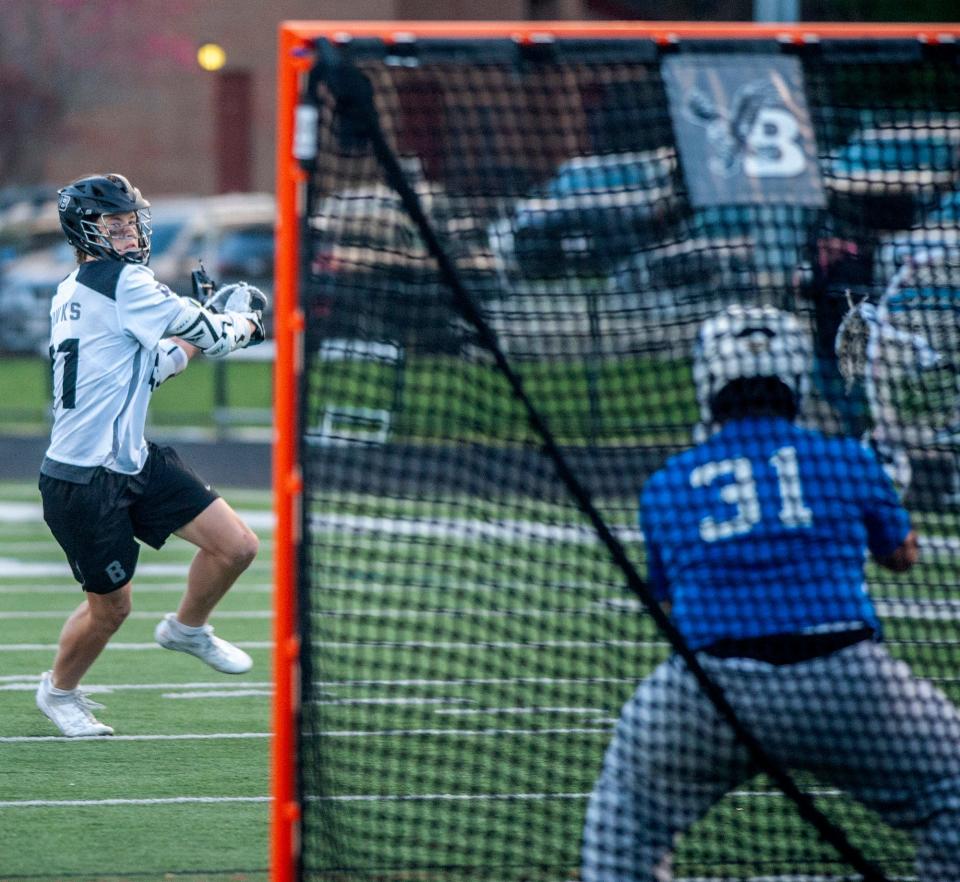 Bellingham High School midfielder Kyle Connors shoots against Ashland, May 2, 2024.