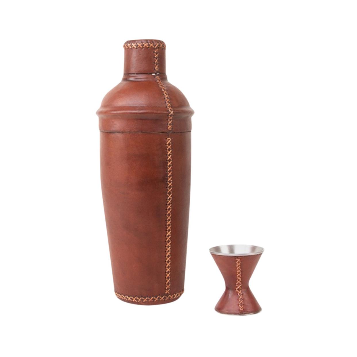 <p><a href="https://gumps.com/products/gumps-leather-cocktail-shaker-jigger-set" rel="nofollow noopener" target="_blank" data-ylk="slk:Shop Now;elm:context_link;itc:0;sec:content-canvas" class="link rapid-noclick-resp">Shop Now</a></p><p>Gump's Leather Cocktail Set</p><p>GUMP'S</p><p>$195.00</p>