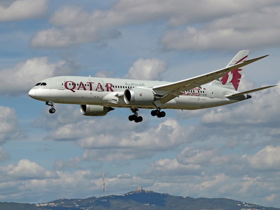 Qatar airways plane flying