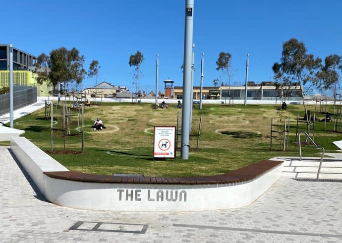 Pictured are a number of circles in a park at Prahran Square. 