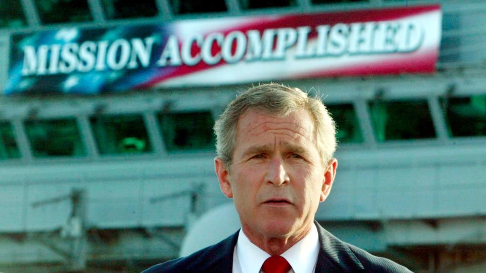 George W Bush declares combat in Iraq over aboard aircraft carrier USS Abraham Lincoln in 2003 (REUTERS/Larry Downing)