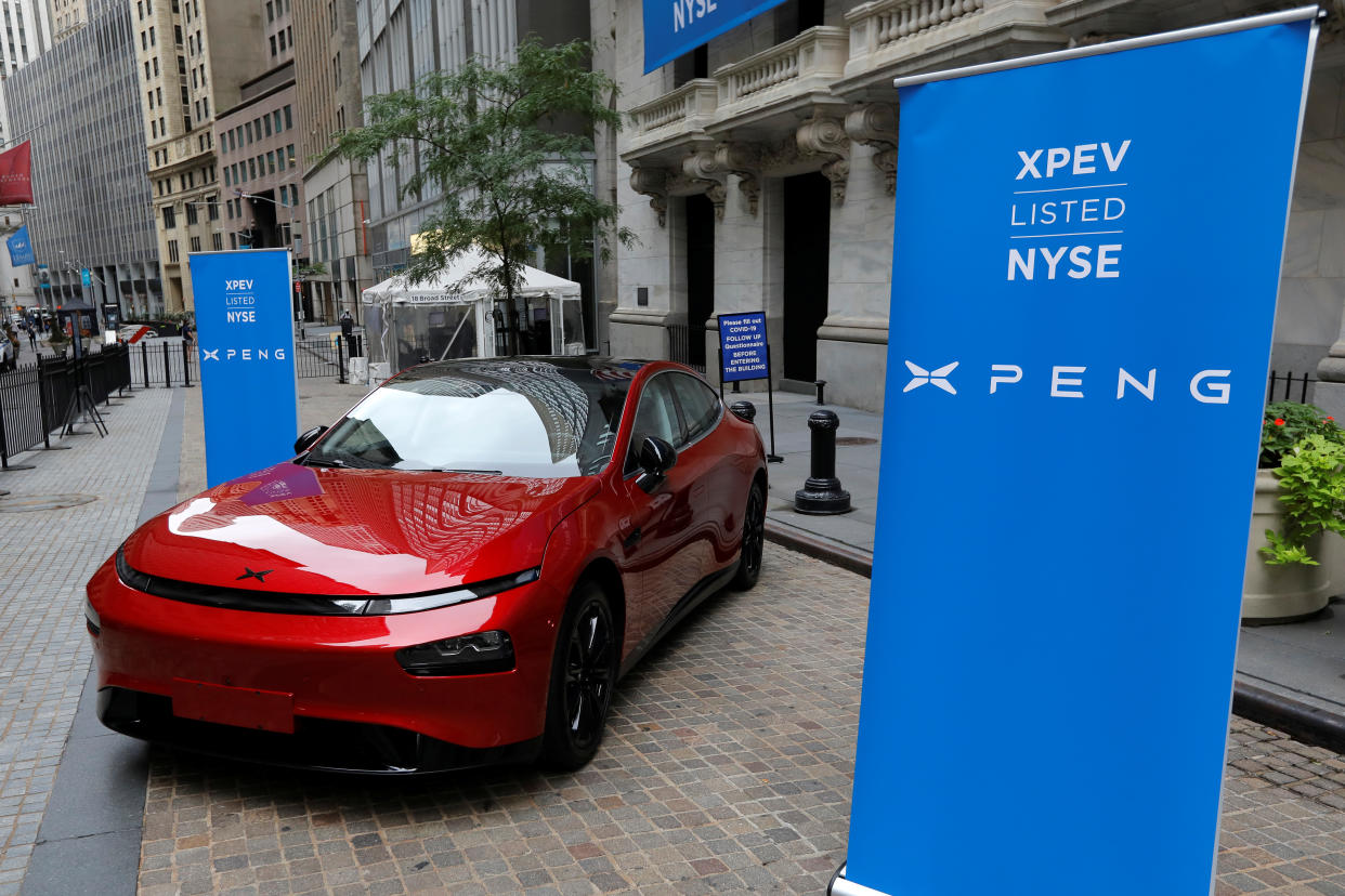 An XPeng Inc. P7 performance electric car is seen outside the New York Stock Exchange (NYSE) ahead of the Chinese company's IPO trading under the stock symbol 