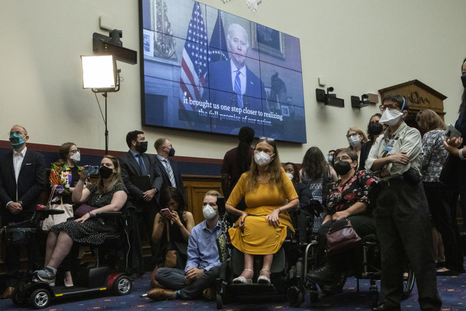 President Biden addresses a reception celebrating the 32nd anniversary of the passing of the Americans With Disabilities Act, on Tuesday