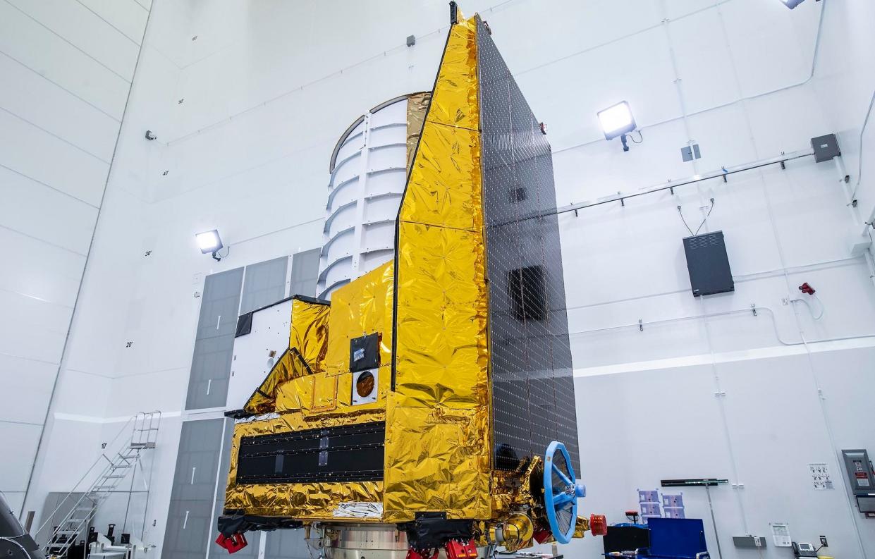 Euclid Space Telescope mounted on SpaceX Falcon 9 rocket in a holding facility before dark energy and dark matter mission launch