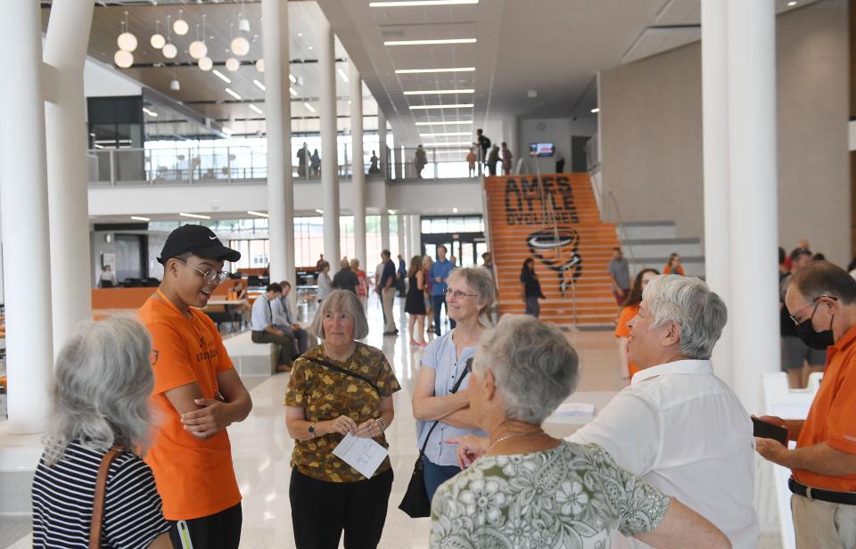 Ames High School student Caleb Dierks guides visitors around the new Ames High School facilities during an open house Saturday, Aug. 2, 2022, in Ames, Iowa.