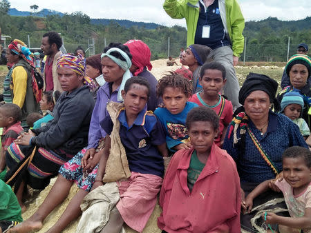 People displaced by an earthquake gather in the central highlands of Papua New Guinea March 1, 2018. Milton Kwaipo/Caritas Australia/Handout via REUTERS