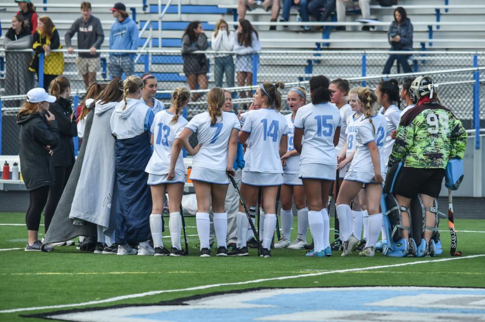 The South Burlington Wolves talk it over during a time out as they host the Mount Abraham Eagles earlier this season in South Burlington.