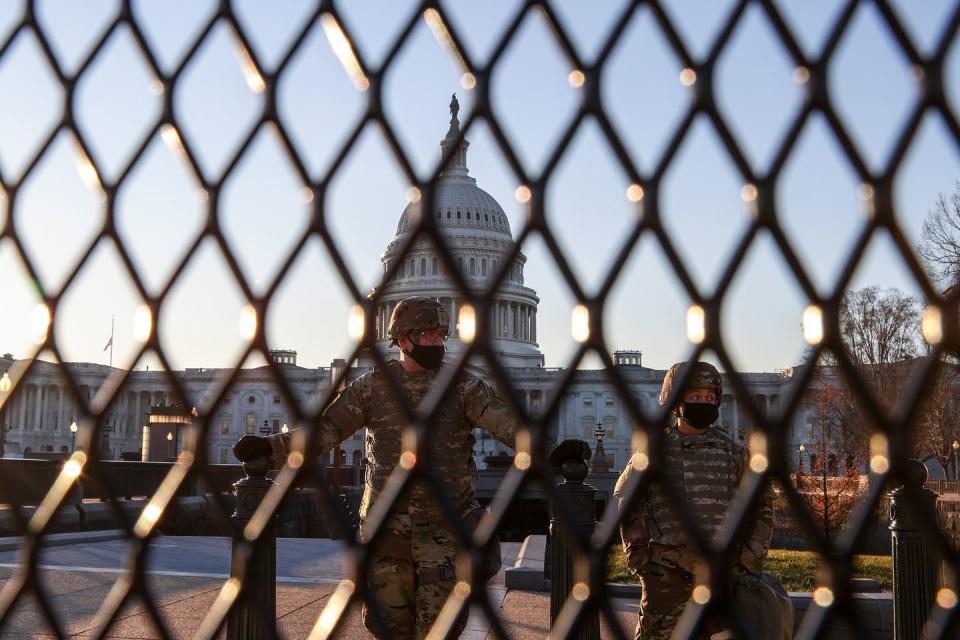 <p>U.S. National Guard troops stand guard at the U.S. Capitol on January 12, 2021 in Washington, DC.</p>