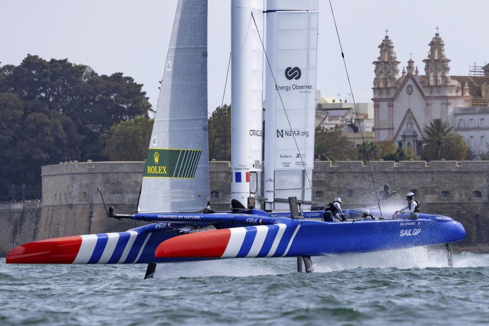 In this photo provided by SailGP, the France SailGP Team, helmed by Quentin Delapierre, sail their way to victory on Race Day 2 as they win their first SailGP event at the Spain Sail Grand Prix in Cadiz, Andalusia, Spain, Sunday, Sept. 25, 2022. (Felix Diemer/SailGP via AP)