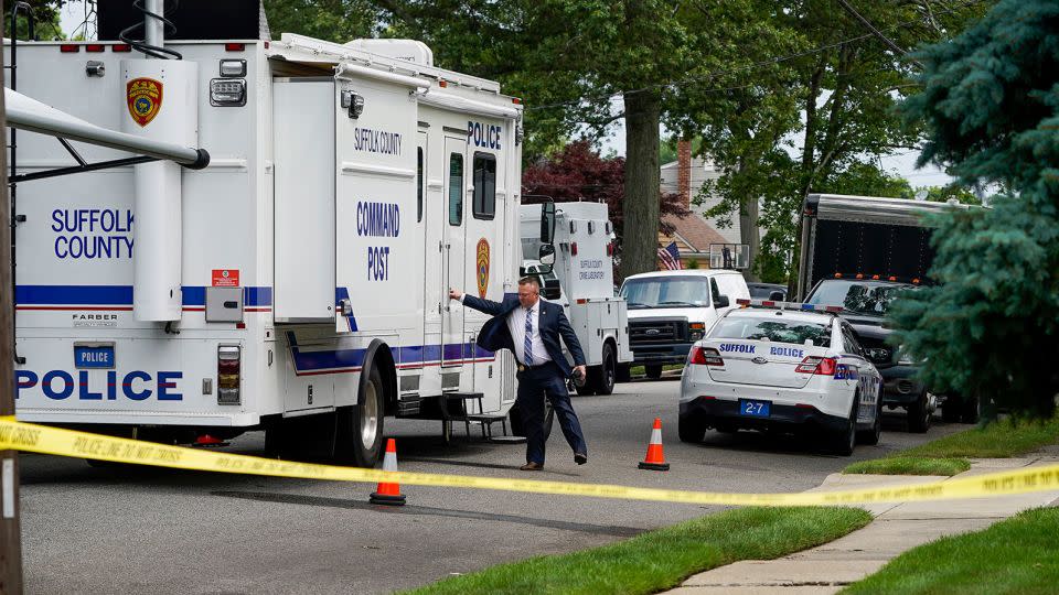 Authorities search Heuermann's home on July 18, 2023, in Massapequa Park, New York. - John Minchillo/AP