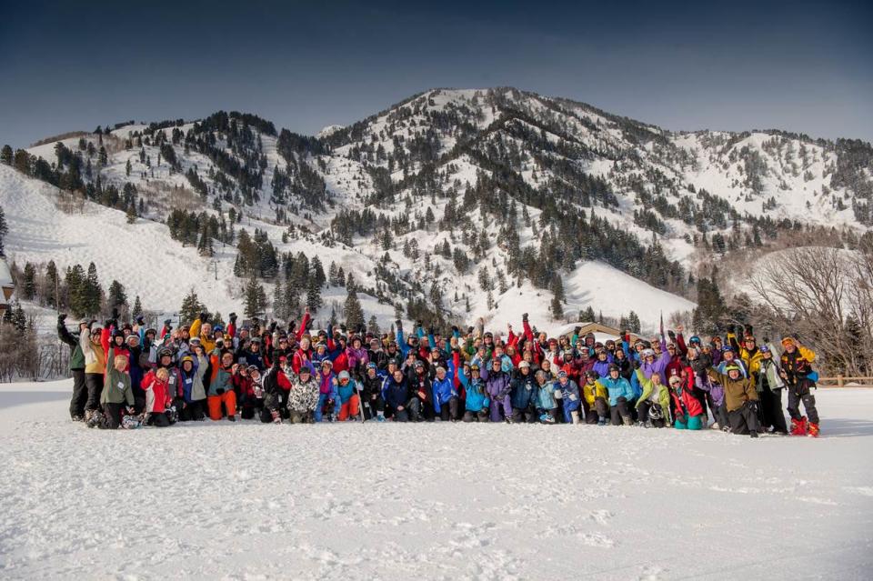 This February 2013 photo shows members of the 70 + Ski Club, a group of skiers age 70 and older, at Snowbasin Resort, Huntsville, Utah. The National Ski Areas Association says the number of seniors on the slopes has been creeping up each year while other age groups hold steady or decline. (AP Photo/70 + Ski Club)