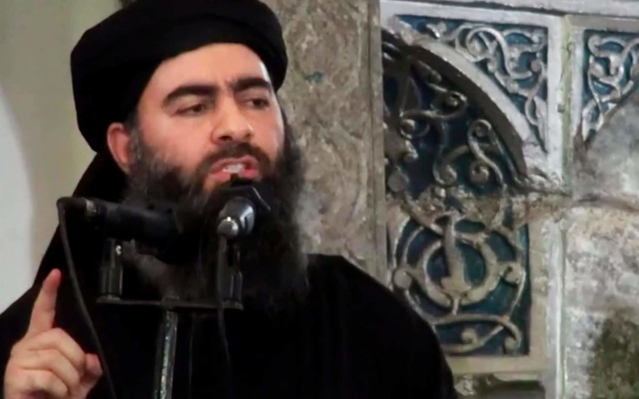 Baghdadi, pictured in a video released in July 2014 - Militant video