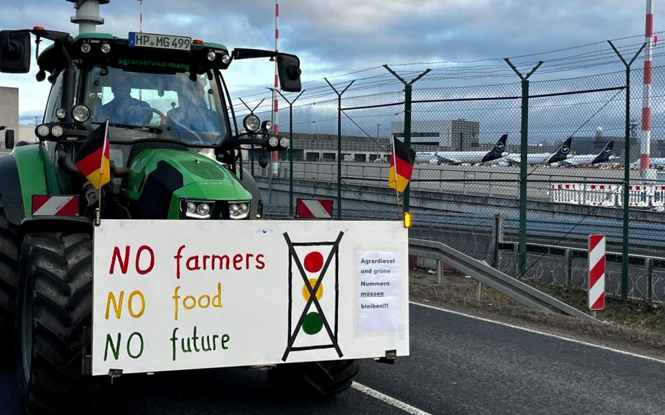 German farmers get their message across outside Frankfurt airport