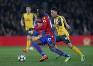Britain Football Soccer - Crystal Palace v Arsenal - Premier League - Selhurst Park - 10/4/17 Crystal Palace's Christian Benteke in action with Arsenal's Mesut Ozil Action Images via Reuters / Matthew Childs Livepic