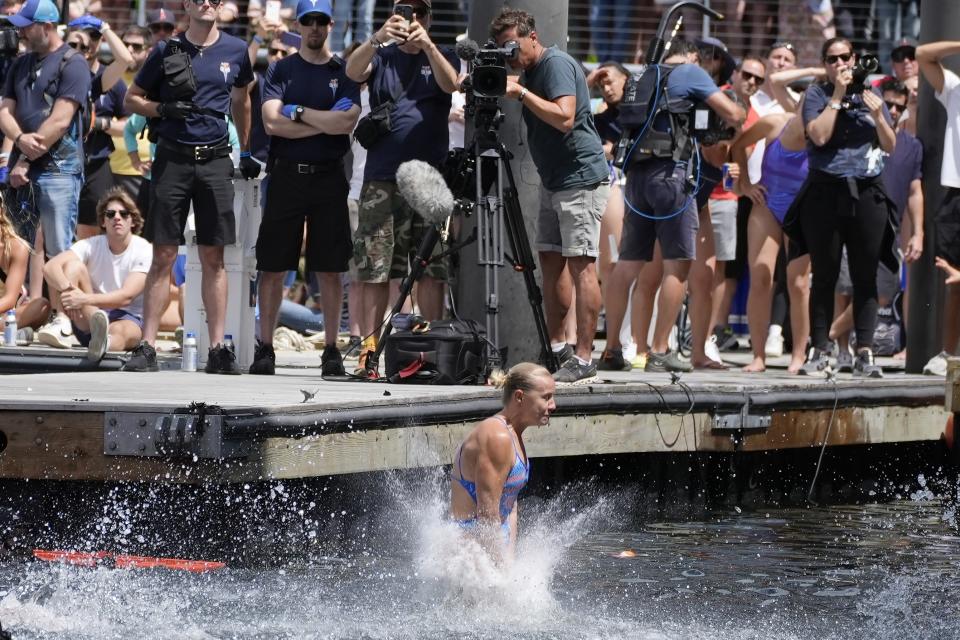 Rhiannan Iffland, of Australia, competes in the Red Bull Cliff Diving World Series, Saturday, June 8, 2024, in Boston. (AP Photo/Michael Dwyer)