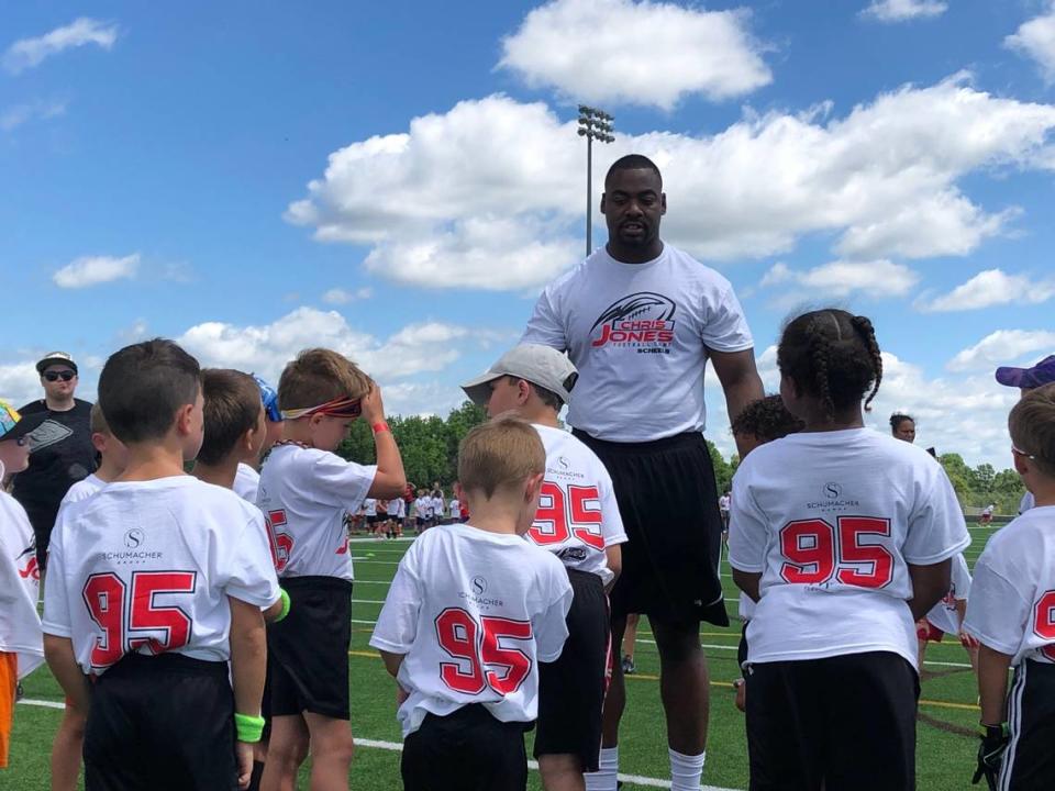 Kansas City Chiefs defensive lineman Chris Jones speaks with players at his youth football camp on Wednesday, June 26, 2024 at Blue Valley Southwest High School in Overland Park, Kansas.