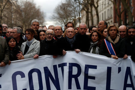 People and officials attend a gathering, organised by the CRIF, in memory of Mireille Knoll, in Paris, France, March 28, 2018. REUTERS/Gonzalo Fuentes