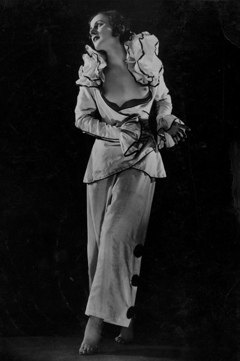 A star of the Casino de Paris in harlequin costume, 1931.