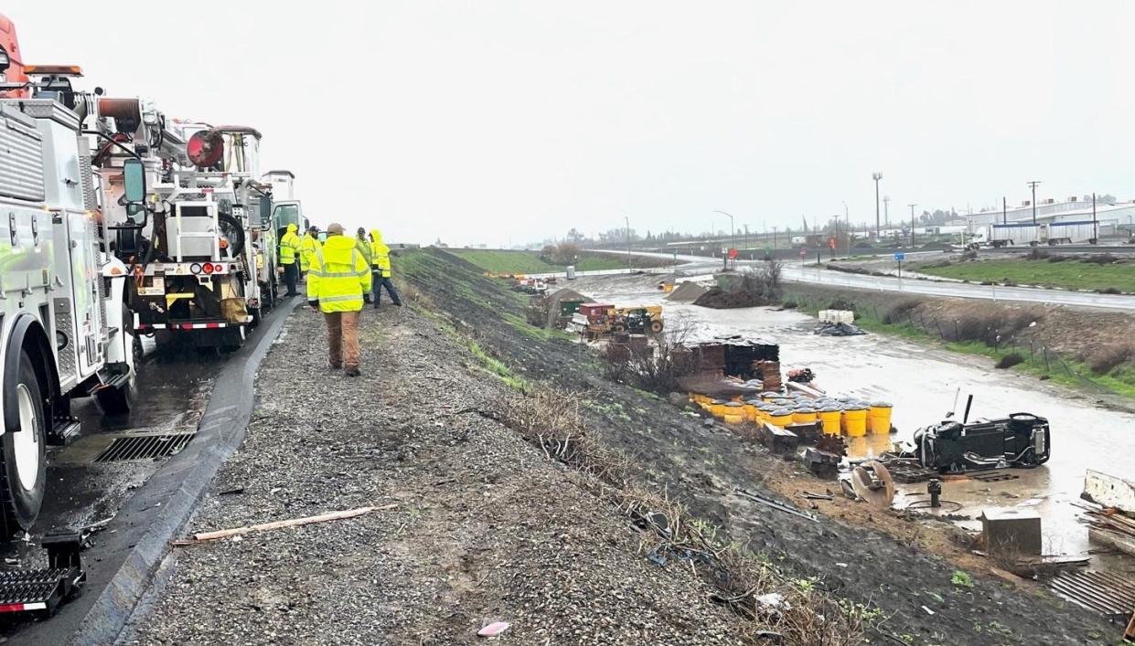 A We Energies crew rescued a woman whose car had plunged off an embankment on U.S. 99 in California. The team was driving back to Wisconsin after helping to restore power in California when the crash happened..