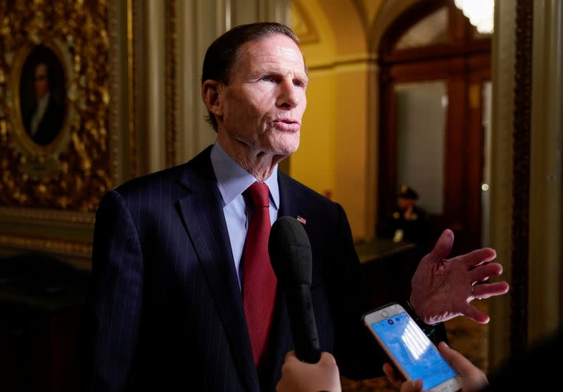 FILE PHOTO: Senator Blumenthal speaks to reporters during a break as the Trump impeachment trial continues in Washington.