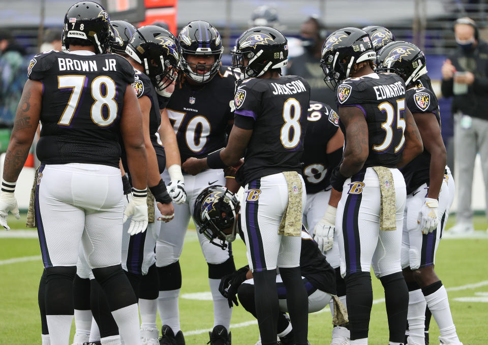 BALTIMORE, MARYLAND - NOVEMBER 22:  Lamar Jackson #8 of the Baltimore Ravens call a huddle against the Tennessee Titans  during the game at M&T Bank Stadium on November 22, 2020 in Baltimore, Maryland. (Photo by Patrick Smith/Getty Images)