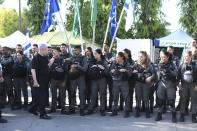 Israeli Prime Minister Benjamin Netanyahu meets with Israeli border police on Thursday, May 13, 2021 in Lod, near Tel Aviv after a wave of violence in the city the night before. Jewish and Arab mobs battled in the central city of Lod, the epicenter of the troubles, despite a state of emergency and nighttime curfew. (AP Photo/Yuval Chen, Yediot Ahronot, Pool)