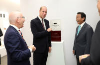 Britain's Prince William talks with Michael Houlihan, Director General of Japan House, and Taro Aso, Japan's Deputy Prime Minister, after unveiling a plaque at the official opening of Japan House in London, Britain, September 13, 2018. Tim P. Whitby/Pool via REUTERS