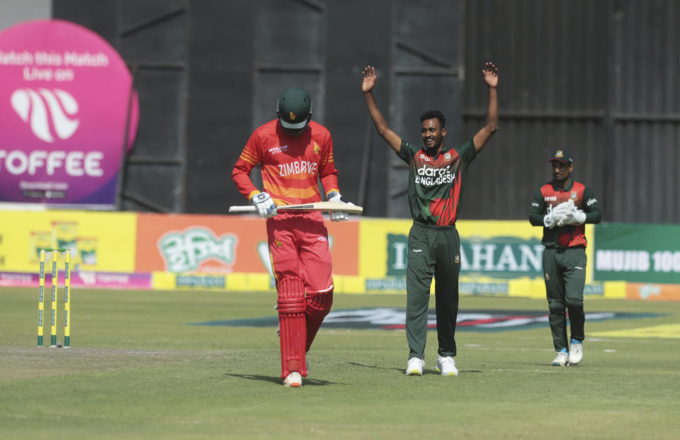 Bangladesh bowler Shoriful Islam, centre, celebrates the wicket of Zimbabwean batsman Blessing Muzarabani, during the second One Day International series cricket match between Zimbabwe and Bangladesh, at Harare Sports Club, in Harare, Sunday, July 18, 2021. (AP Photo/Tsvangirayi Mukwazhi)