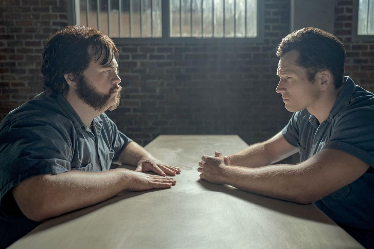 taron egerton and paul walter hauser in black bird