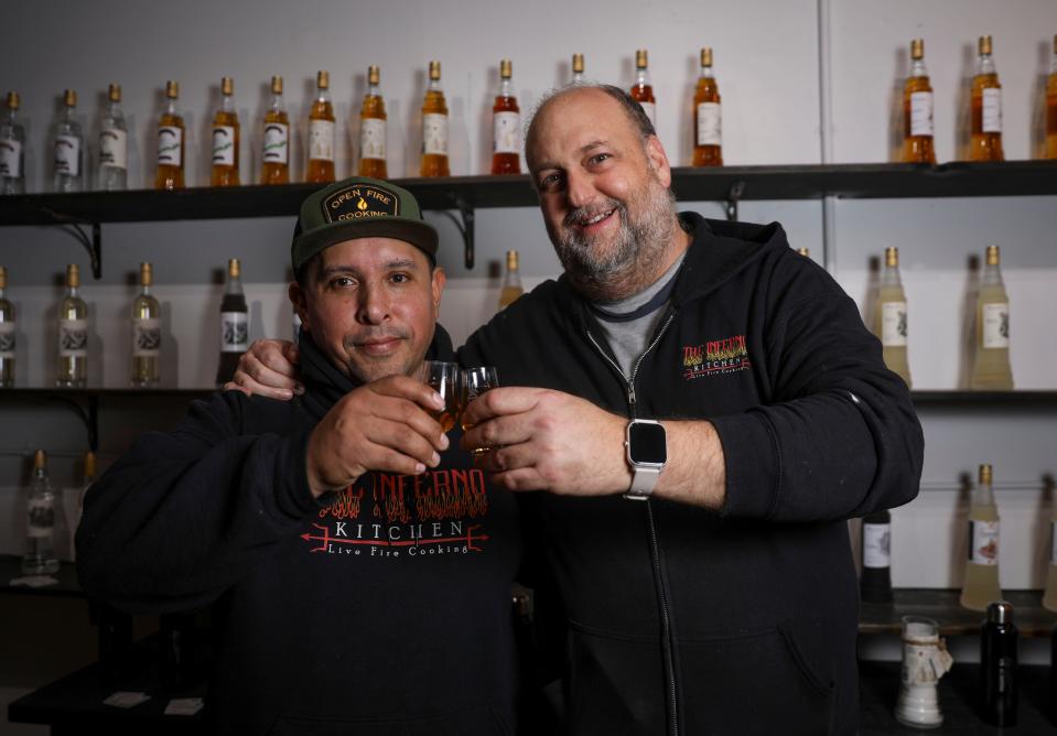 Inferno chef Victor Perez and Divine Distillers owner Jason Greenwood stand at the space in Independence in January.