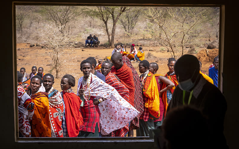 Maasai wait in line to cast their votes