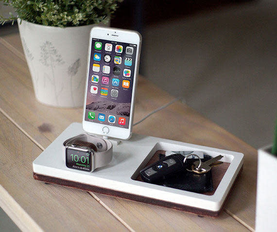 Supports&nbsp;iPhone (5 &amp; up including iPhone 8, 8 Plus &amp; X) and all models of Apple Watch.<br /><br />Get it on <a href="https://www.etsy.com/listing/465495723/nytstnd-tray-2-white-free-shipping?ga_order=most_relevant&amp;ga_search_type=all&amp;ga_view_type=gallery&amp;ga_search_query=charging%20station%20organizer&amp;ref=sr_gallery-1-33" target="_blank">Etsy</a>, $49+.