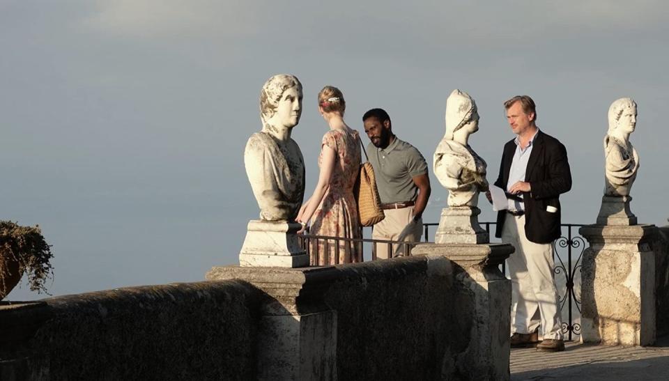 Elizabeth Debicki, John David Washington and Christopher Nolan on the set of 'Tenet', 2020