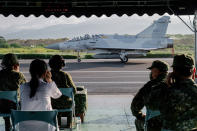 In this photo released by the Taiwan Presidential Office, a military jet taxis along a highway in Jiadong, Taiwan, Wednesday, Sept. 15, 2021. Four military aircraft landed on the highway and took off again on Wednesday as part of Taiwan's five-day Han Guang military exercise designed to prepare the island's forces for an attack by China, which claims Taiwan as part of its own territory. (Taiwan Presidential Office via AP)