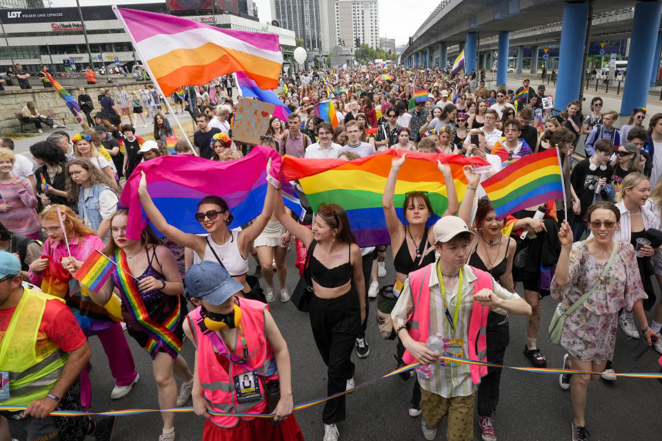 People take part in Poland's yearly Pride parade, known as the Equality Parade, in Warsaw, Poland, on Saturday June 17, 2023. This year's event was dedicated to transgender rights, which are facing a backlash in many countries. (AP Photo/Czarek Sokolowski)