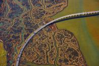 <p>One of the bridges over the marshlands in Andalusia, Spain. (Photo: Jassen Todorov/Caters News) </p>