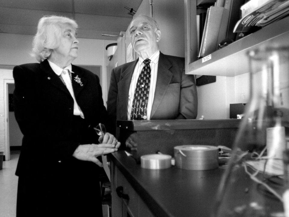 Isabelle Karle and Nobel Prize winner Jerome Karle stand next to each other at the Naval Research Lab in 1998