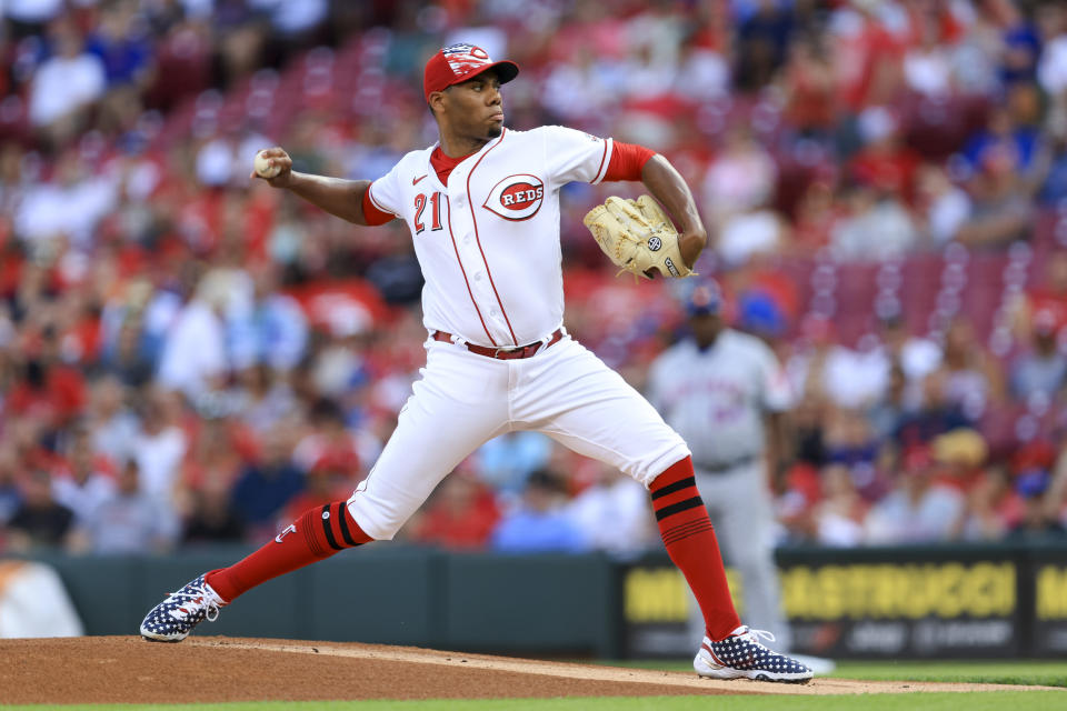 Cincinnati Reds' Hunter Greene throws during the first inning of a baseball game against the New York Mets in Cincinnati, Monday, July 4, 2022. (AP Photo/Aaron Doster)