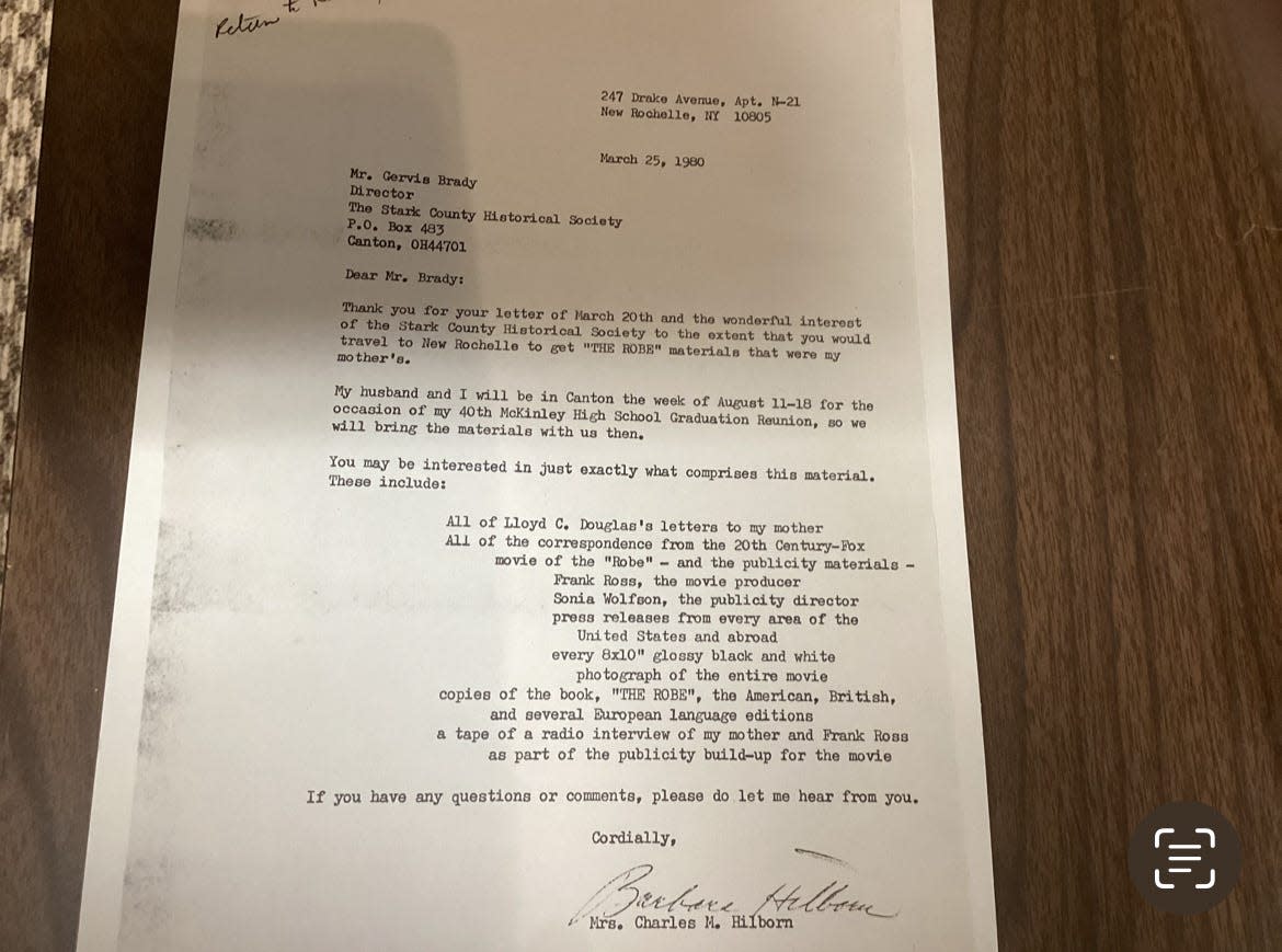 A letter from Hazel McCann's daughter, Barbara Hilborn, then of New Rochelle, New York, addressed to Gervis Brady, then the director of Stark County Historical Society, notes her intention to donate material collected by her mother relating to her connection to the book and the film "The Robe." The material, now archived in McKinley Presidential Library & Museum's Ramsayer Research Library, includes photographs, personal correspondence between McCann and author Lloyd Douglas, promotional material for the book and film, a tape of a radio interview with McCann, and newspaper articles about "The Robe" from throughout the country.