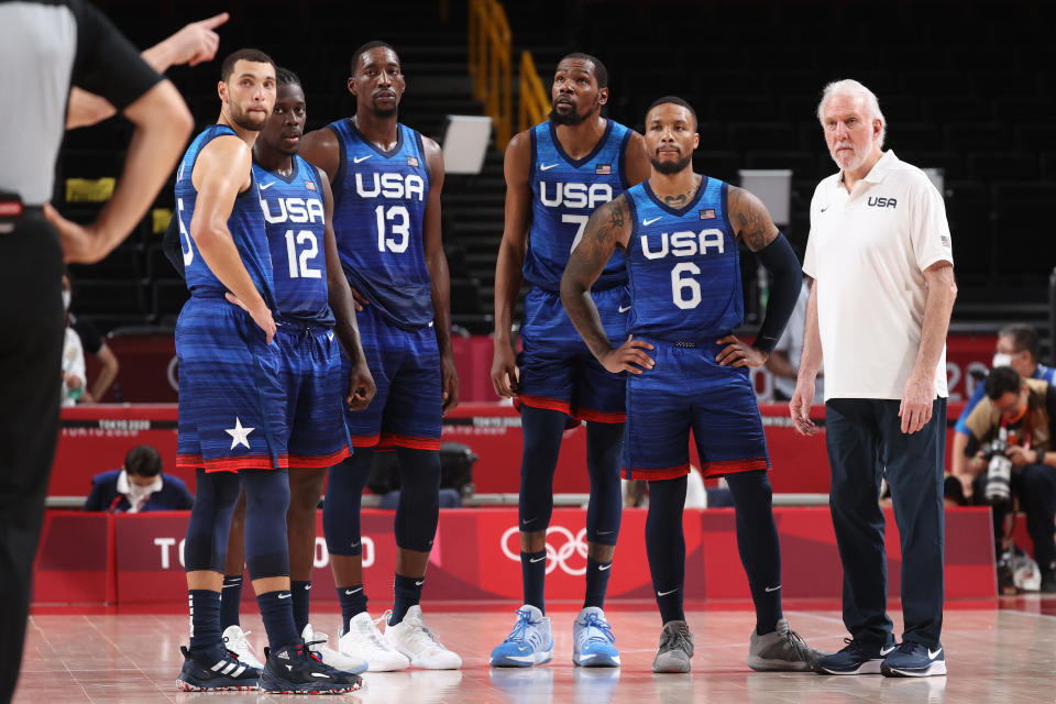 Zach Lavine, Jrue Holiday, Bam Adebayo, Kevin Durant, Damian Lillard and Head Coach Gregg Popovich of Team United States of America on July 25, 2021. / Credit: Gregory Shamus/Getty