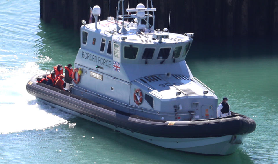 A group of people thought to be migrants are brought into Dover, Kent, following a number of small boat incidents in The Channel earlier this morning. On Sunday Home Secretary, Priti Patel, announced a "new operational approach" to dealing with small boat crossings, creating a Franco-British intelligence cell.