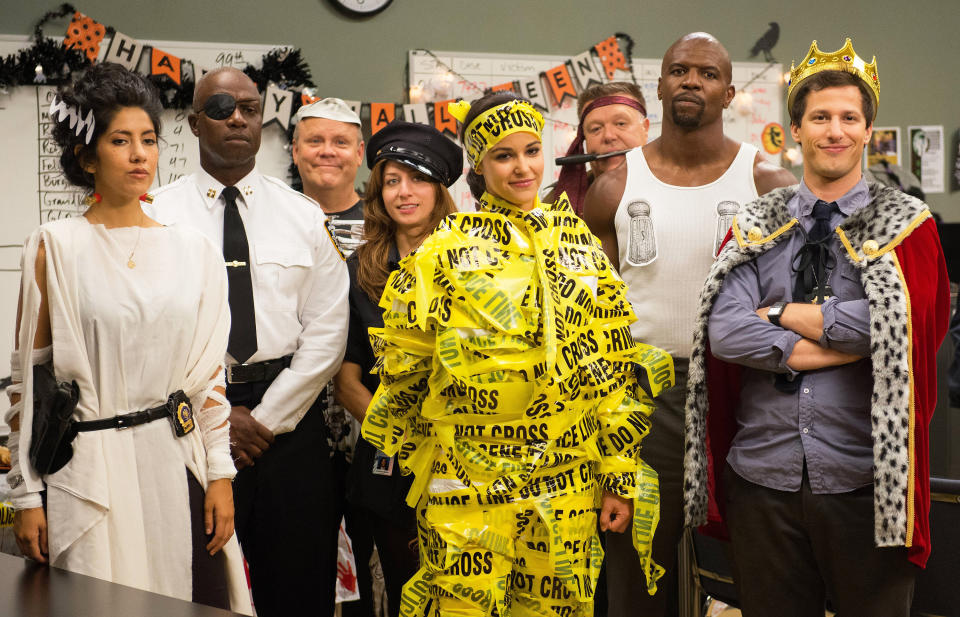 Stephanie Beatriz, Andre Braugher, Dirk Blocker, Chelsea Peretti, Melissa Fumero, Joel McKinnon, Terry Crews and Andy Samberg adorn Halloween costumes