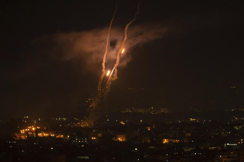 Rockets are launched from the Gaza Strip towards Israel, in Gaza, Wednesday, May 10, 2023. (AP Photo/Fatima Shbair)