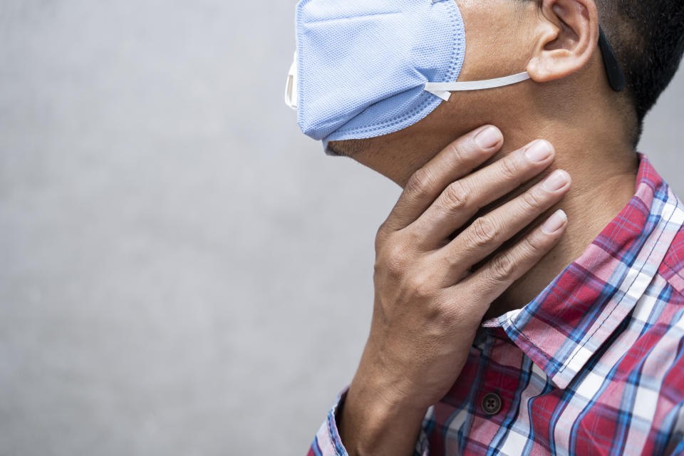 Group A streptococcus is more severe than other types of streptococcus. (Getty) Studio photo from a young man with a mask Isolated sick patients have sore throat.