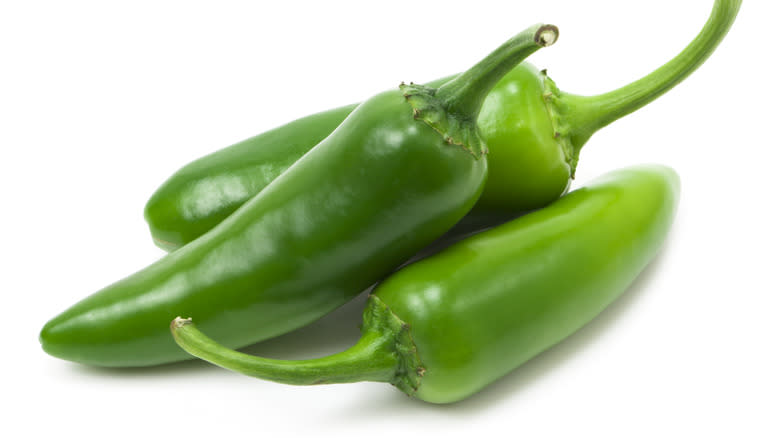 three jalapeño peppers